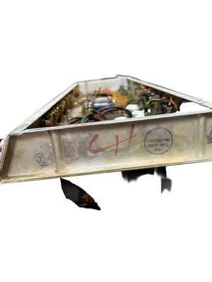 Tray containing electrical or mechanical parts, wires, and connectors similar to those in a 1966 Fender Black Panel Twin Reverb 2-Channel 85-Watt 2x12" Guitar Combo Amp w/Case by Fender, with numbers and markings on the side.