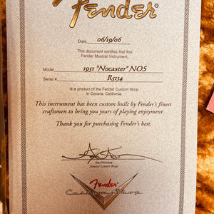 A certificate from Fender dated 06/19/06 certifies the Fender Custom Shop '51 Reissue Nocaster NOS 2006, signed by Alex Nicholas, Director of the Fender Custom Shop.