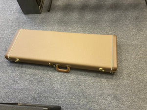 Brown case holding a Fender Custom Shop Jaguar Journeyman guitar, showcasing its limited edition design and craftsmanship.