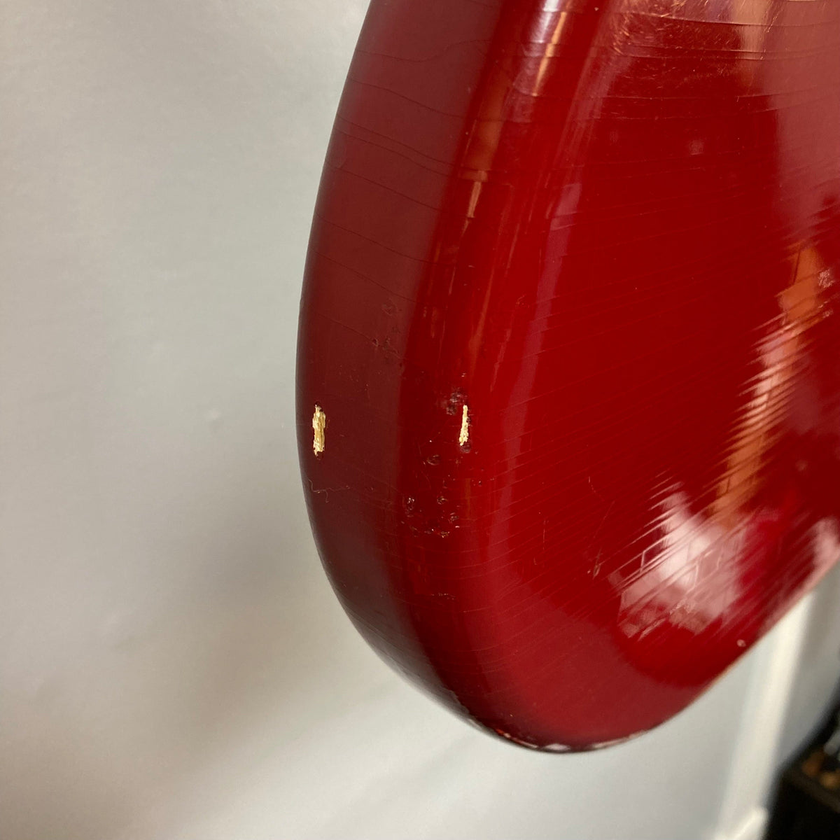 Fender Duo-Sonic II Dakota Red 1966 Vintage guitar with visible scratches and blemishes, showcasing a shorter 24 scale length and dual pickups.