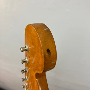 Fender Duo-Sonic II 1966 guitar neck close-up, highlighting minor blemishes and finish checking.