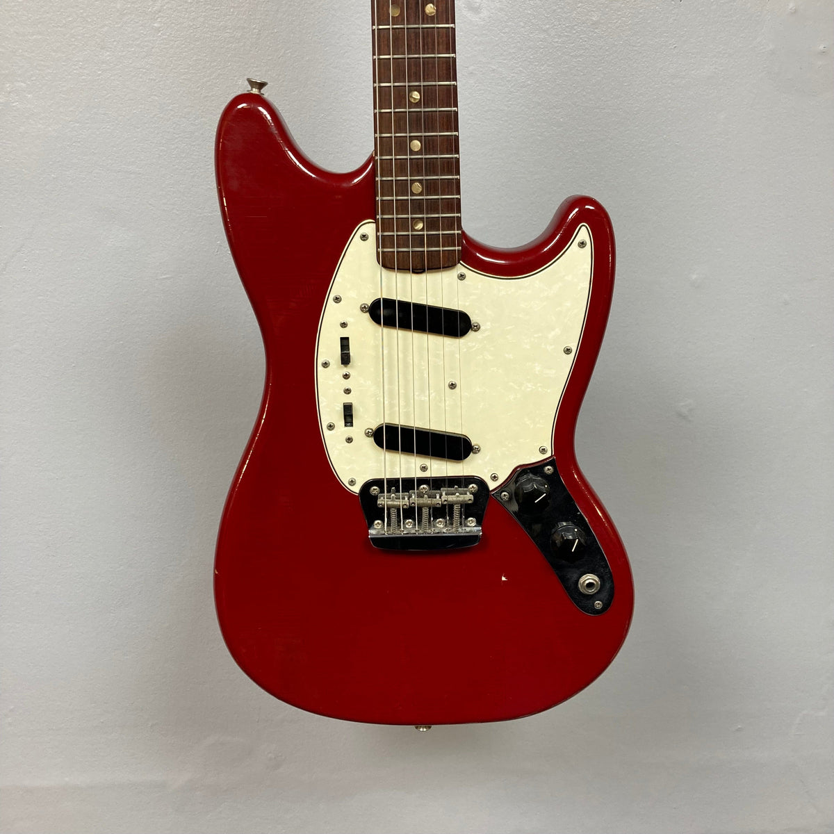 Fender Duo-Sonic II Dakota Red 1966 Vintage electric guitar with minor body blemishes and heavy finish checking, displayed with a case.