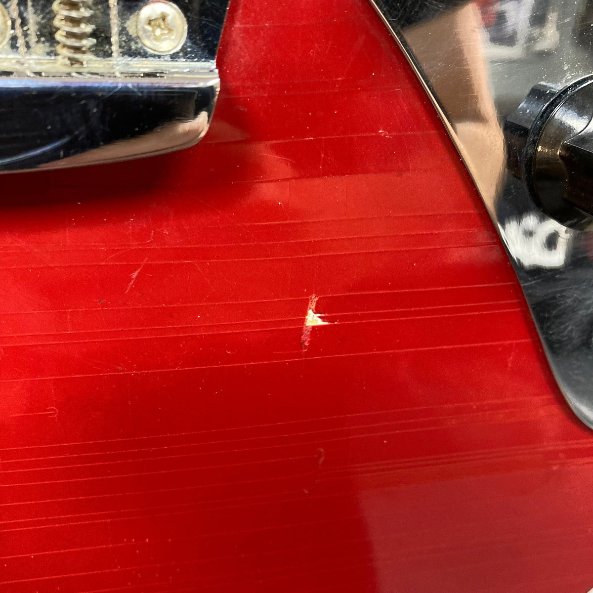 Fender Duo-Sonic II Dakota Red 1966 Vintage guitar, close-up showing minor blemishes and heavy finish checking, dual-pickup design, shorter 24 scale length.