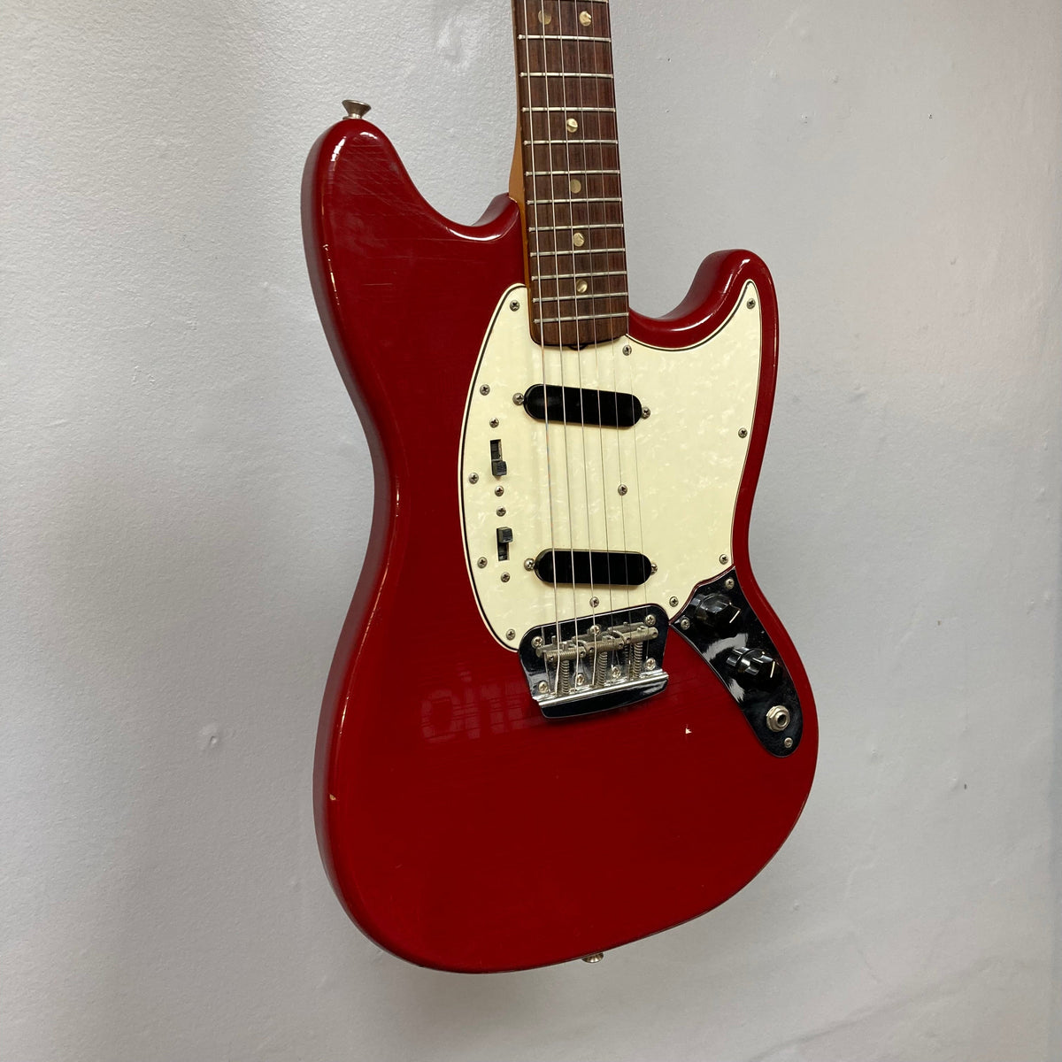 Fender Duo-Sonic II Dakota Red 1966 vintage electric guitar with minor blemishes and heavy finish checking, featuring dual pickups and a 24 scale length.