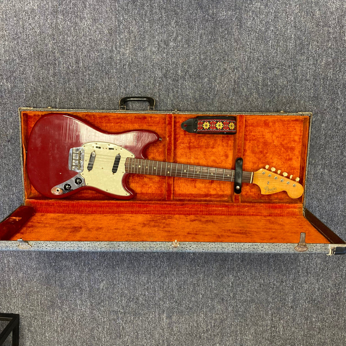 Fender Duo-Sonic II Dakota Red 1966 Vintage electric guitar in a case, showing minor blemishes and finish checking.