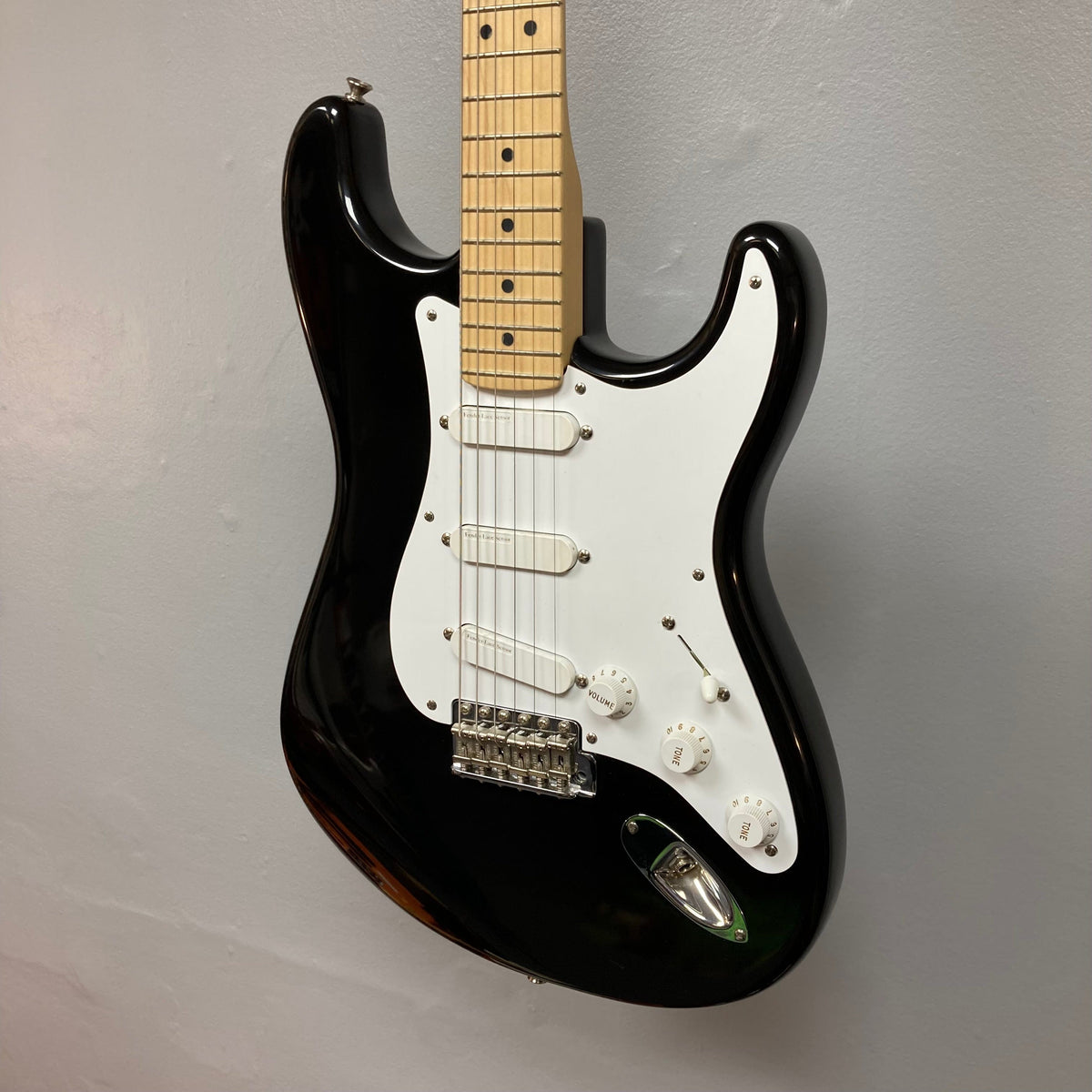 Fender Eric Clapton Artist Series Stratocaster USA 2001 w/Case, pristine condition, close-up of guitar body and controls, iconic collectible from Guitars on Main.