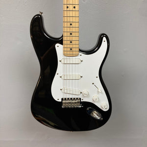 Fender Eric Clapton Artist Series Stratocaster USA 2001 electric guitar, close-up of volume knob and bridge, includes original case.