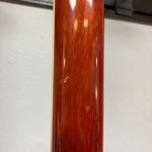 Close-up of the Fender FR-50CE Resonator, showcasing its wooden construction and resonator cone, emphasizing its vintage blues aesthetics.