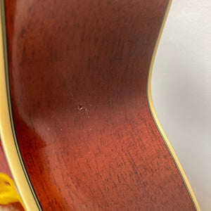 Close-up of a used Fender FR-50CE Resonator, highlighting its mahogany body and resonator cone for blues and slide guitar enthusiasts.