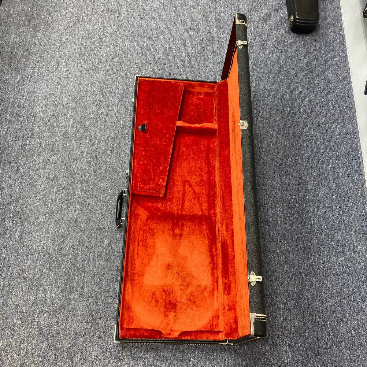 Vintage Fender Guitar Case from the late '60s to early '70s, open on the floor, perfect for collectors and musicians seeking authentic period-correct protection.