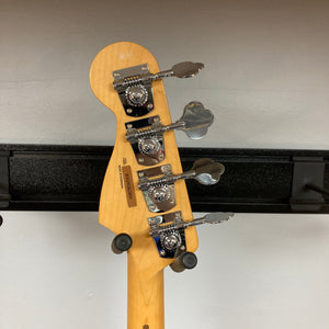 Fender Player II Jazz Bass close-up, showcasing its alder body, modern neck, and pickups, highlighting its blend of classic design and modern features.