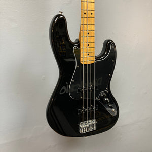 Fender Player II Jazz Bass Black Refurb on display, showcasing its contoured alder body and modern C neck profile, highlighting its classic and contemporary features.