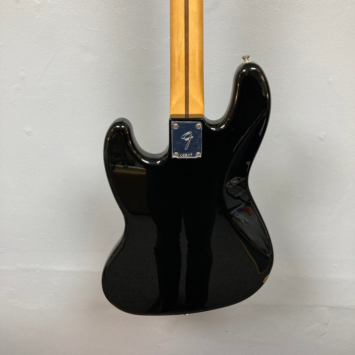 Fender Player II Jazz Bass Black Refurb, showcasing the contoured body and modern neck profile, ideal for versatile playability and tonal range.
