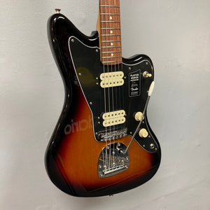 Fender Player Jazzmaster 3-Tone Sunburst Refurb w/Gigbag, featuring a solidbody with a modern C maple neck and dual humbuckers, displayed on a wall.