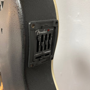 Close-up of a Fender Stratacoustic Pink Paisley guitar, highlighting its detailed body and built-in electronics for versatile sound.