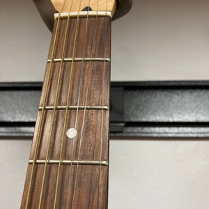 Close-up of the Fender Stratacoustic Pink Paisley guitar neck, highlighting its detailed craftsmanship and built-in electronics for versatile sound.