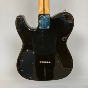 Fender Telecaster TLAC MIJ Acoustic/Electric Hybrid 1993-1997 with a black body, blue/silver strap, and advanced electronics for versatile sound.