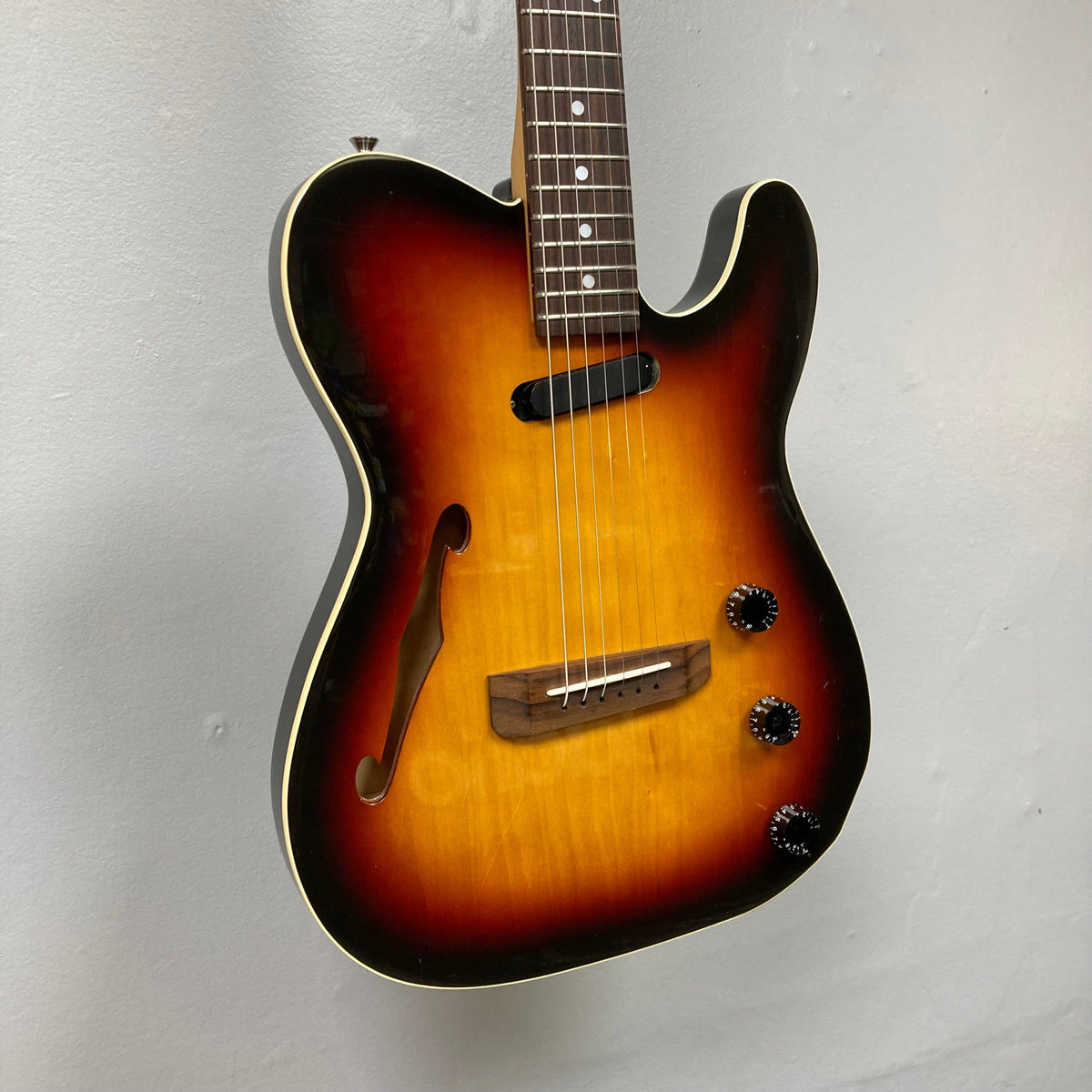Fender Telecaster TLAC MIJ Acoustic/Electric Hybrid 1993-1997 3 Color Sunburst, close-up of strings and neck, featuring vintage worn finish.
