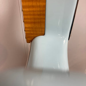 Fender Vintera '50s Stratocaster Sonic Blue USED; close-up of flamed-maple neck fitting into body, highlighting a subtle finish crack at neck pocket.