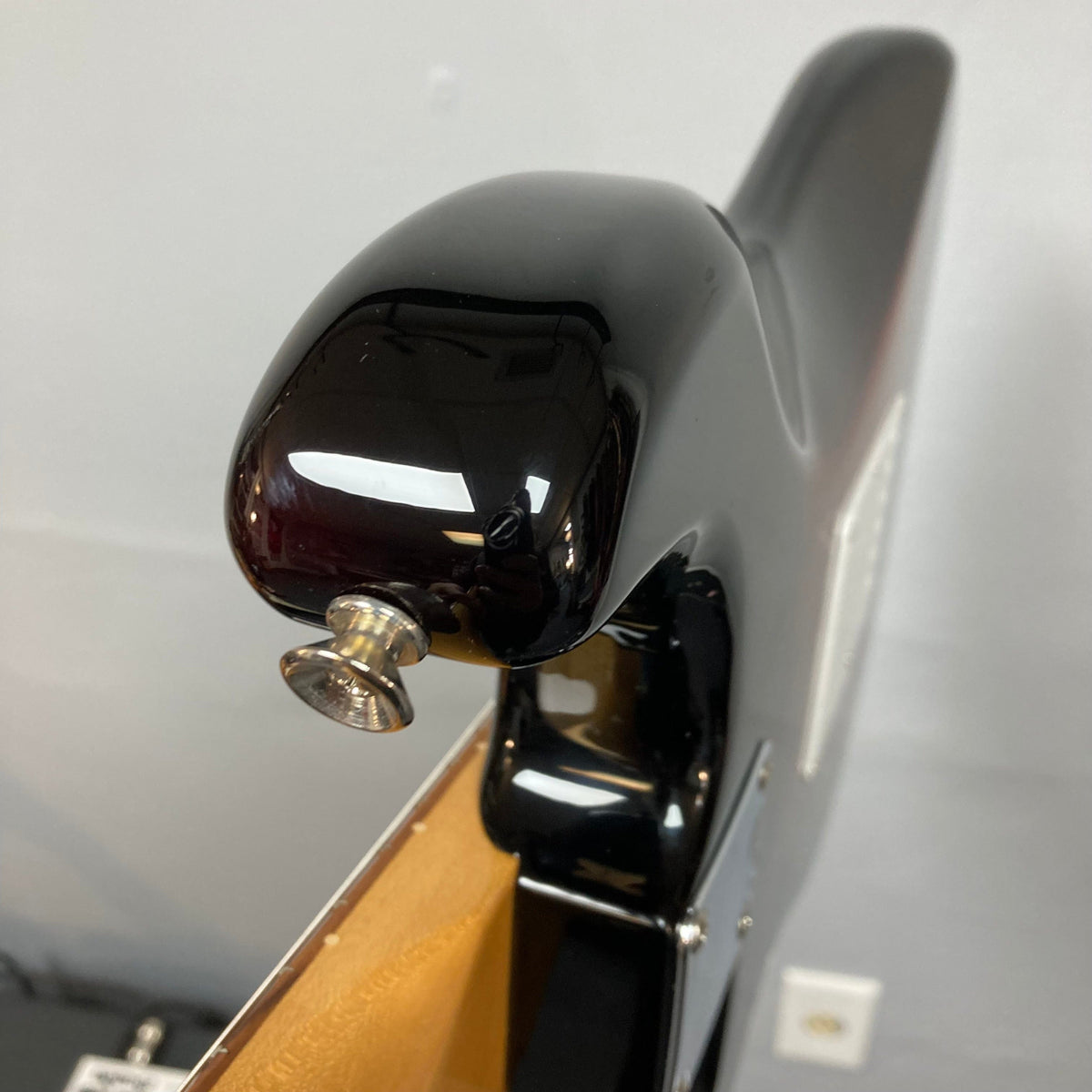 Fender Vintera '60s Stratocaster with silver knob, close-up of vintage-style tremolo bridge and pickups.