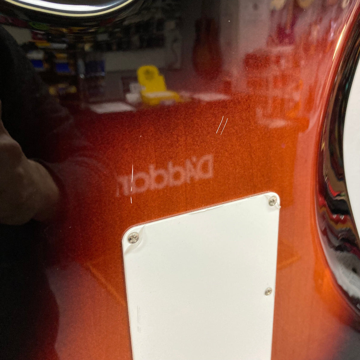 Close-up of the Fender Vintera '60s Stratocaster 3-Tone Sunburst Refurb w/Gigbag, highlighting the tremolo bridge and pickups.