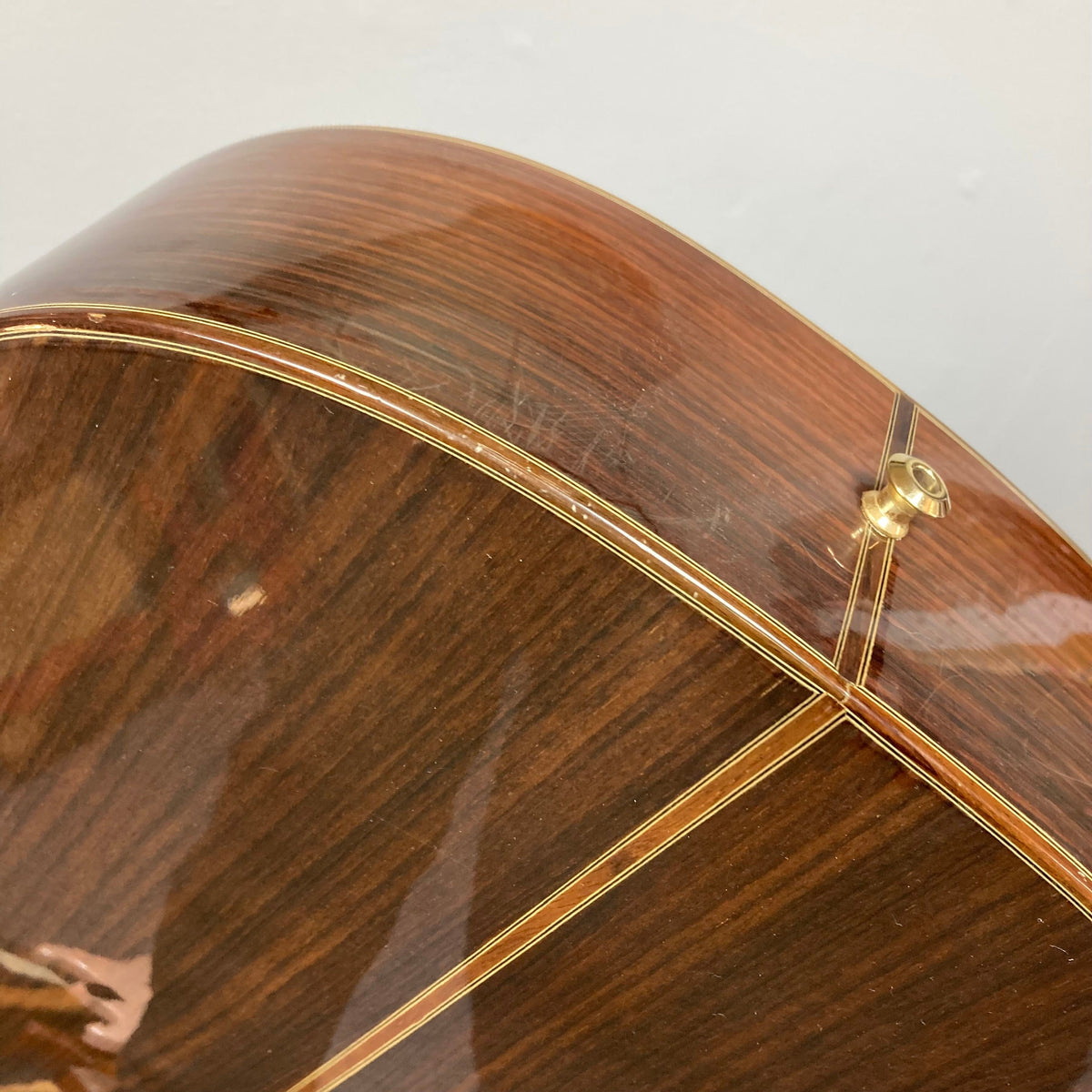 Close-up of a Giambattista G8 Natural Used classical guitar, showcasing its detailed craftsmanship and high-quality tonewoods.
