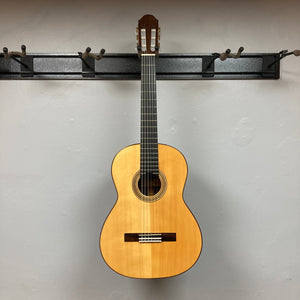 Giambattista G8 Natural Used guitar on display, showcasing its detailed craftsmanship and classical design features, suitable for both student and professional musicians.