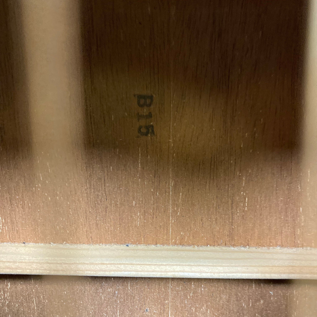 Gibson B-15 1967-1969 Natural acoustic guitar close-up, showing detailed wood grain and number marking on the surface.