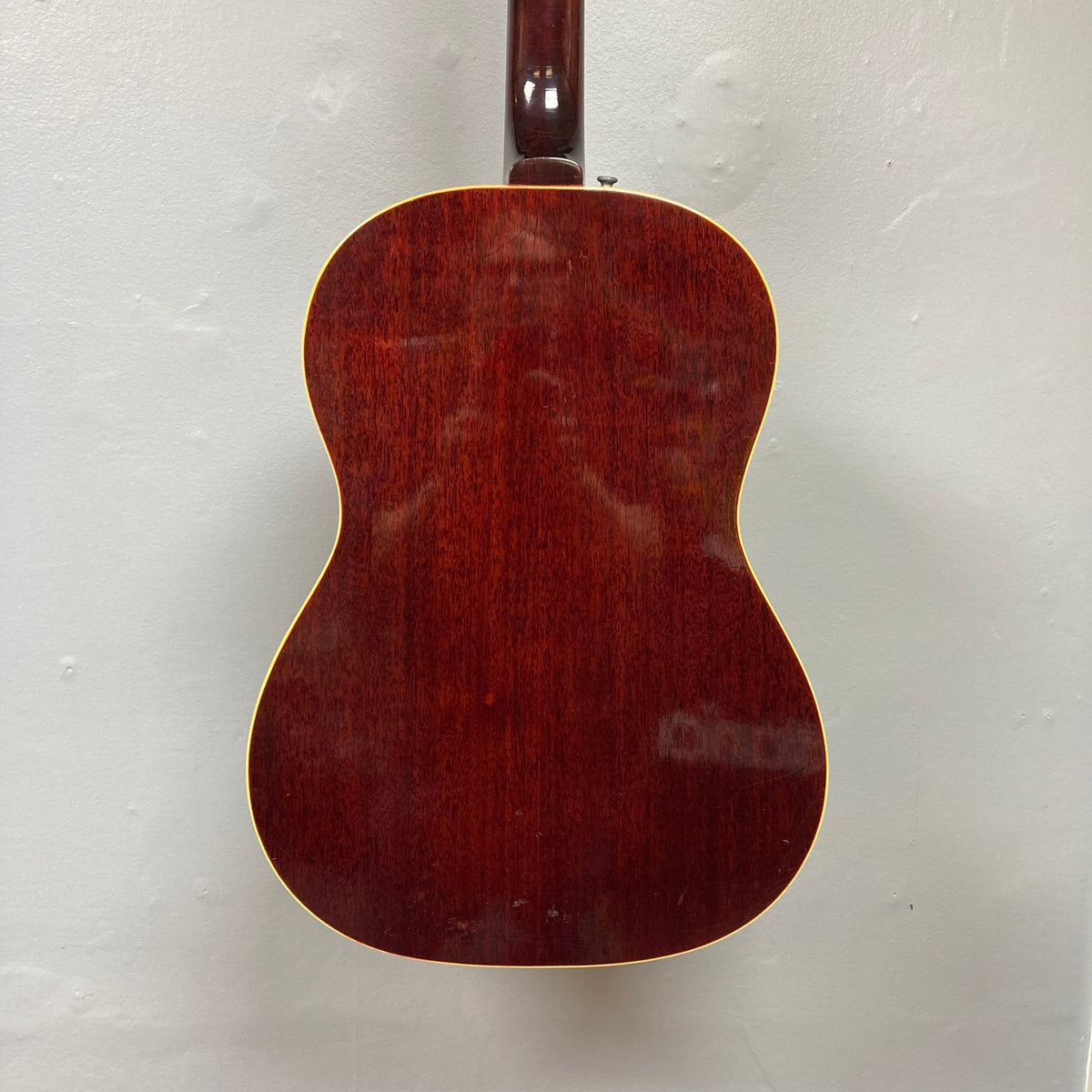 Close-up of a 1968 Gibson B25 Acoustic Guitar, showcasing vintage checking and craftsmanship from Gibson's Kalamazoo era.