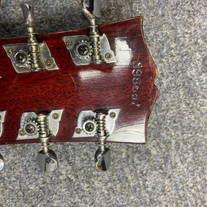 Close-up of a 1968 Gibson B25 Acoustic Guitar, highlighting its vintage checking and detailed craftsmanship.