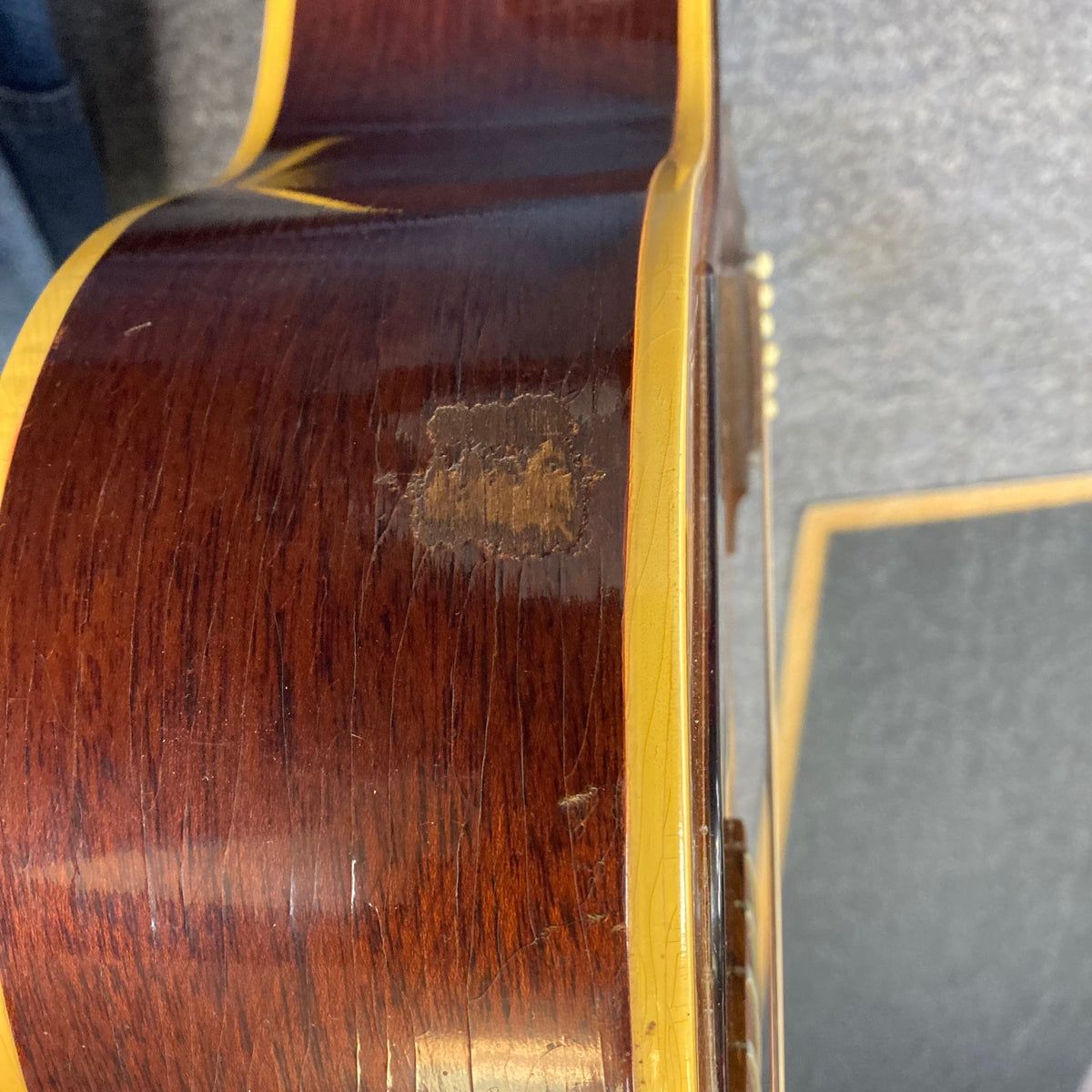 Gibson B-25 Acoustic Guitar Natural 1968, close-up of the body, highlighting vintage checking and craftsmanship from Kalamazoo.