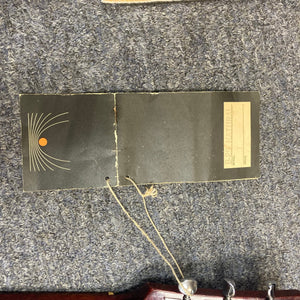 Gibson B-25 Acoustic Guitar 1968 with checking patterns, string attachments, and serial number on paper in the image context.