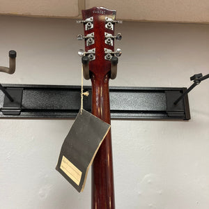 Gibson B-25 Acoustic Guitar Natural 1968 with tag, showcasing vintage checking and classic craftsmanship.