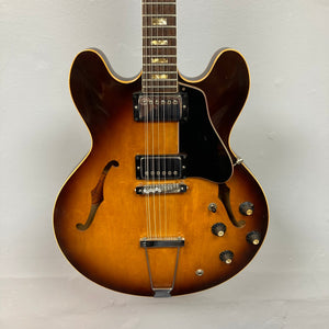 Gibson ES-335TD-12 1968 Sunburst electric guitar with 12 strings, semi-hollow body, and sunburst finish, showcasing vintage craftsmanship and iconic design.