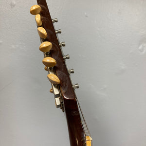 Close-up of the guitar neck of the 1968 Gibson ES-335TD-12 Sunburst 12-string guitar.