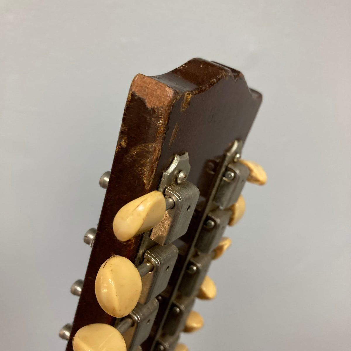 Close-up of a vintage 1968 Gibson ES-335TD-12 12-string guitar with sunburst finish, showcasing its semi-hollow body and double-cutaway design.