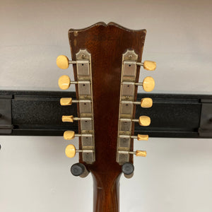 Gibson ES-335TD-12 1968 Sunburst w/Case, featuring a close-up of the headstock and tuning pegs, highlighting its vintage craftsmanship.