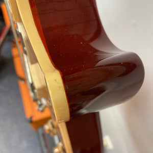 Close-up of the Gibson Les Paul Standard Premium Plus 2003 Ice Tea Burst guitar, showcasing its exquisite flamed maple top and luxurious finish.