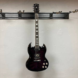 Gibson SG Modern Exclusive Dark Purple Burst Blem on wall hook, featuring sleek design and premium components.