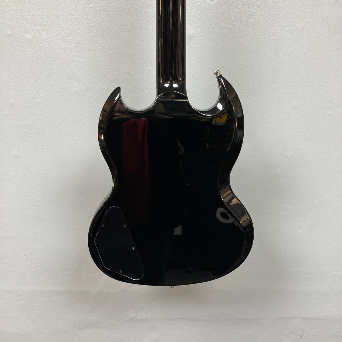Gibson SG Modern Exclusive Dark Purple Burst Blem electric guitar on a white surface.