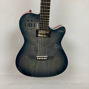 The Godin A6 Ultra Denim Blue Flame SF with Bag is a semi-hollow body electric guitar featuring six strings, a cutaway, two pickups, and visible wood grain, shown against a plain white wall.