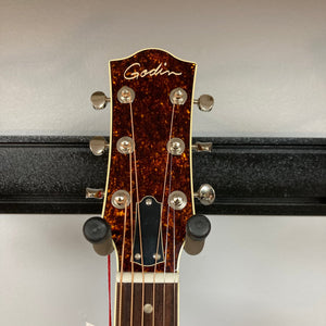 Close-up of the Godin Metropolis Natural RN GT EQ guitar headstock with tuning pegs.