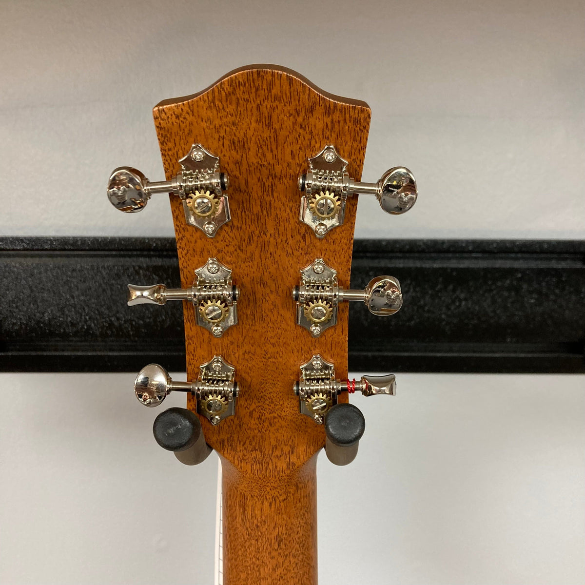 Back view of the Godin Metropolis Natural RN GT EQ acoustic guitar, showcasing its mahogany back and sides with a smooth, polished finish.