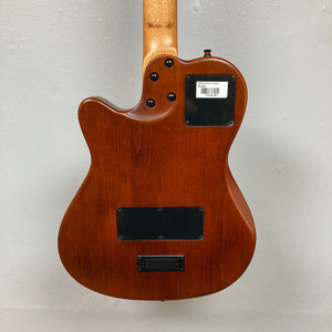 Close-up of the back of a Godin Prototype Ltd Mundial Dark Cedar w/GigBag electric guitar, showcasing its wooden body and craftsmanship.