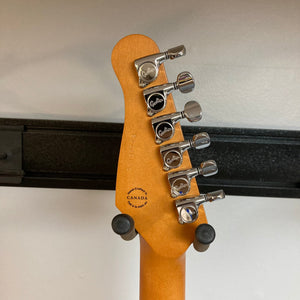 Close-up of the Godin Session HT MN Aztek Red electric guitar, showcasing its fixed bridge, maple fingerboard, and HSS pickup configuration.