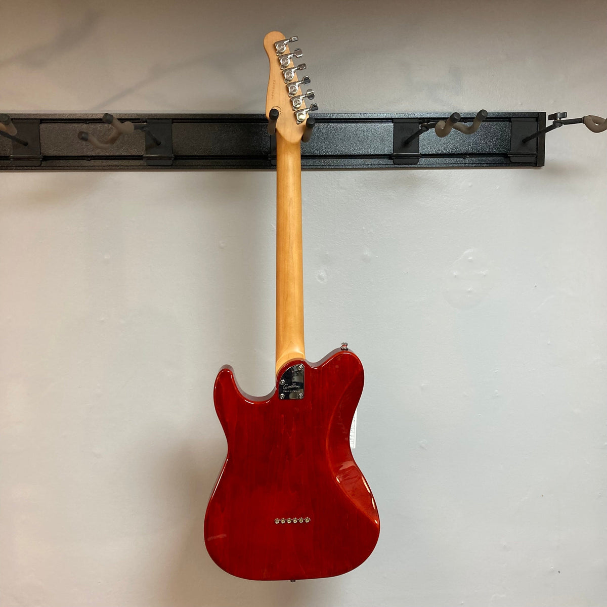 Godin Stadium Pro Sunset Burst MN w/GigBag Electric Guitar, featuring dual pickups, three-way switch, and adjustable bridge for precise intonation.