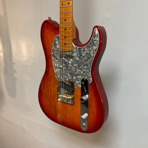 Godin Stadium Pro Sunset Burst MN w/GigBag Electric Guitar close-up, showcasing its Laurentian Basswood body and Rock Maple neck, highlighting premium pickups and adjustable bridge.