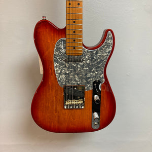 Close-up of the Godin Stadium Pro Sunset Burst MN Electric Guitar, showcasing the detailed bridge, knobs, and strings.