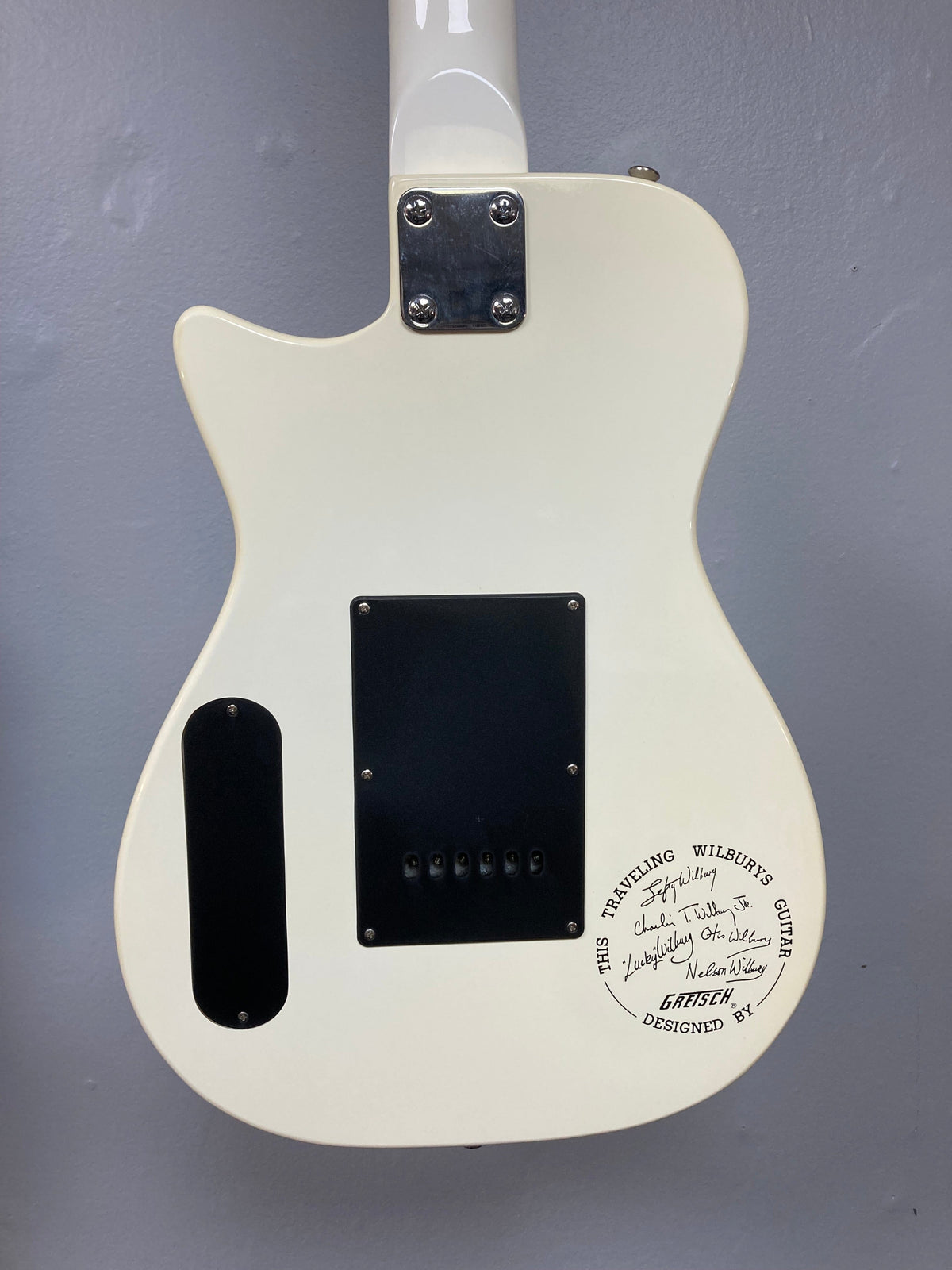 Gretsch Traveling Wilburys TW-100T Electric Guitar with black and white markings, featuring original accessories and significant collectible value.