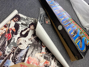 Gretsch Traveling Wilburys TW-100T Electric Guitar with original box, poster, and unopened cassette tape, displayed on a carpet.